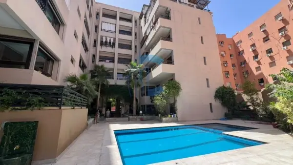 APPARTEMENT 2 CHAMBRES MEUBLÉ AVEC TERRASSE ET PISCINE AU DERNIER ÉTAGE À VENDRE - GUÉLIZ MARRAKECH